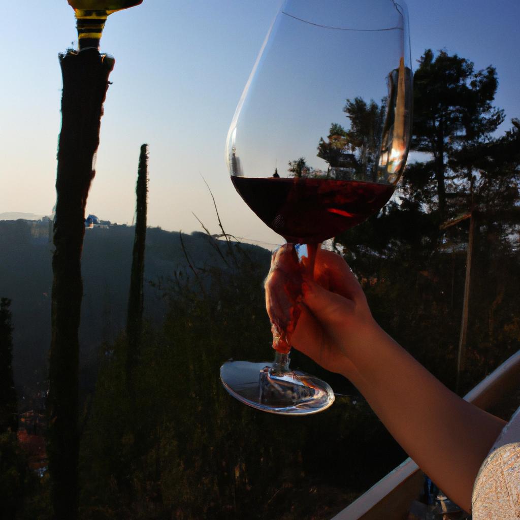 Person enjoying wine and ambiance